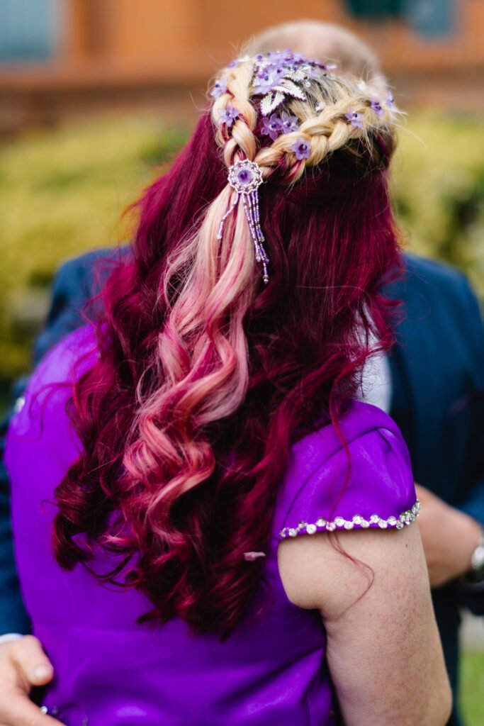 Picture of hair accessories as part of a custom set of jewellery featuring Amethyst to match the brides dress with Miyuki seed beads, Lucite flowers and Fimo Polymer Clay flowers
