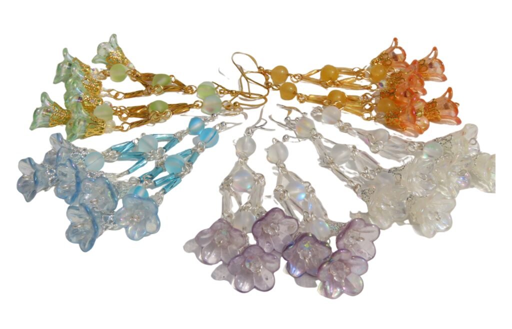 Using simple materials, Lucite flowers, gemstones and bugle beads, Fiona of Fifi and the Peacock has handcrafted these light weight and very wearable chandelier style earrings.  Part of the brand new The Enchanted Faerie Court Collection