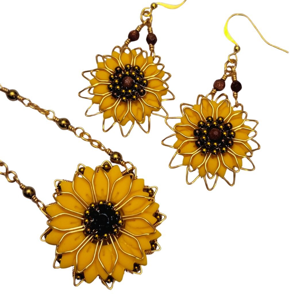 Unique Sunflower Necklace and Earrings designed and crafted by Fiona of Fifi and the Peacock.  Part of the Bold Bloom & Wild Wonders Collection.  Created using a technique combining wire work, polymer clay and seed beading, incorporating genuine gemstones.